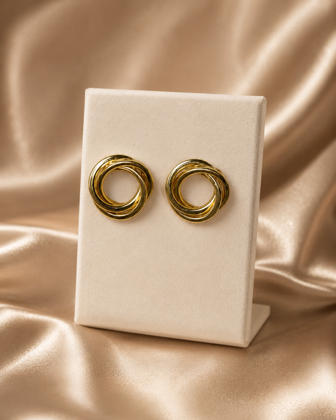 Gold-plated interlocked knot stud earrings